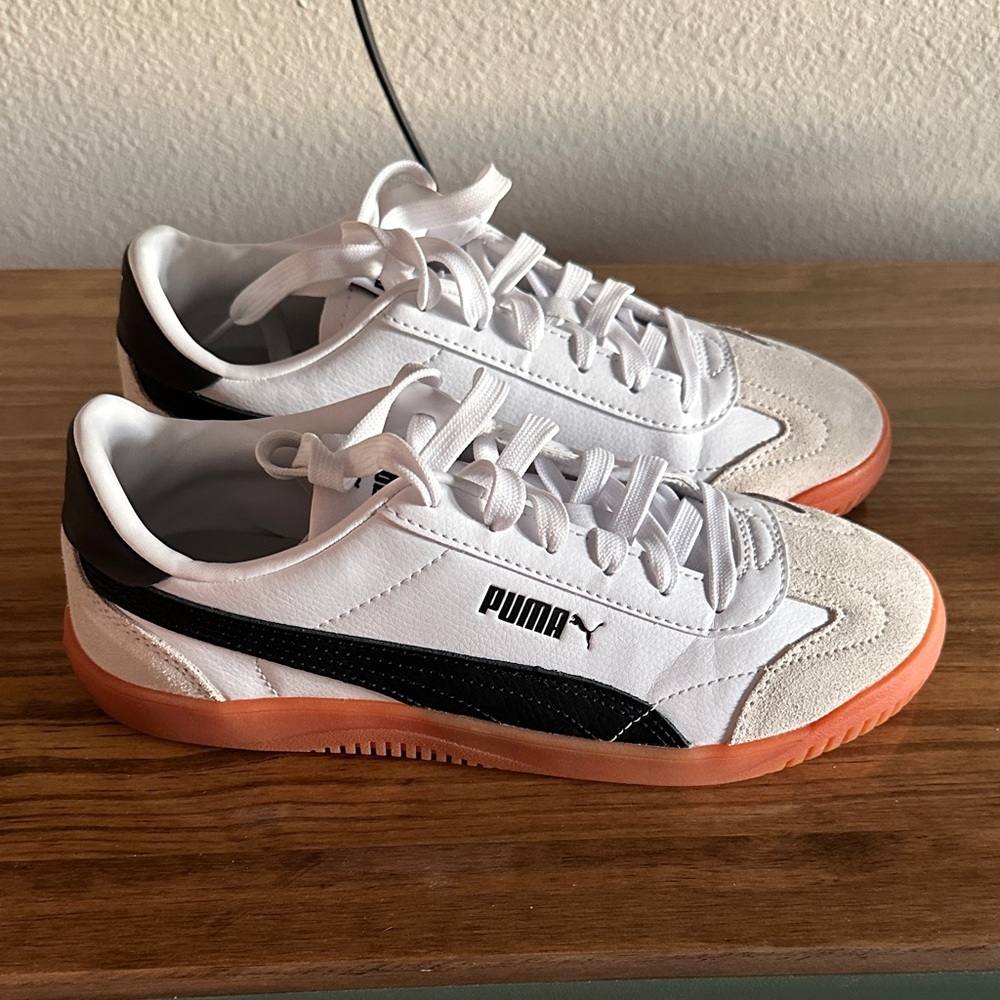 PUMA Sneakers in White with Black and Orange Accents